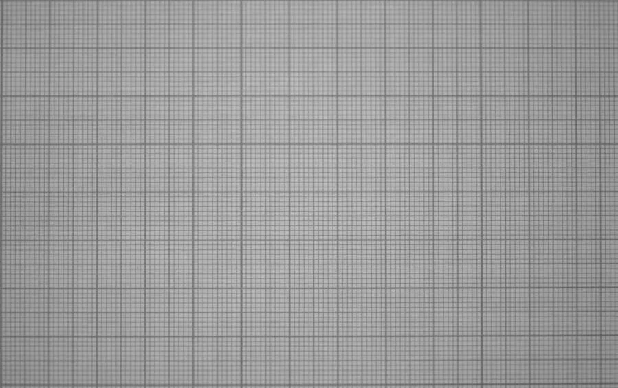 Grid-of-lines test image captured through the custom VIS-NIR lens at 400 mm working distance showing 130 by 80 mm field of view with negligible visible distortion